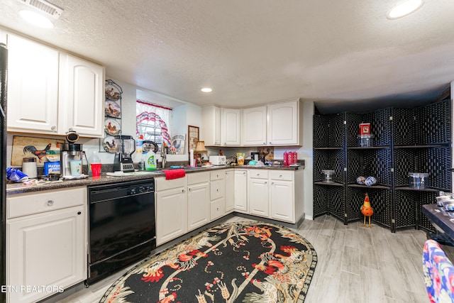 kitchen featuring a textured ceiling, sink, light hardwood / wood-style flooring, dishwasher, and white cabinetry