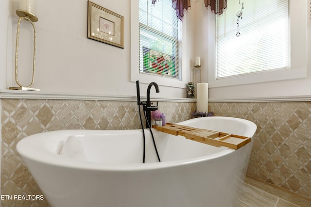 bathroom with a bathing tub