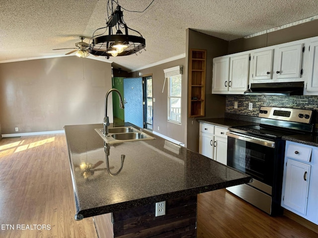 kitchen with lofted ceiling, hardwood / wood-style floors, sink, electric range, and white cabinetry