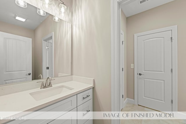 bathroom featuring vanity and tile patterned floors