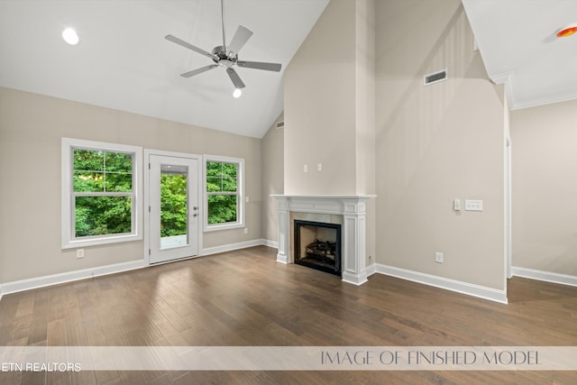 unfurnished living room with ceiling fan, high vaulted ceiling, and dark hardwood / wood-style flooring