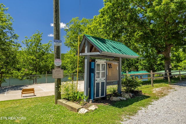 view of outdoor structure with a yard