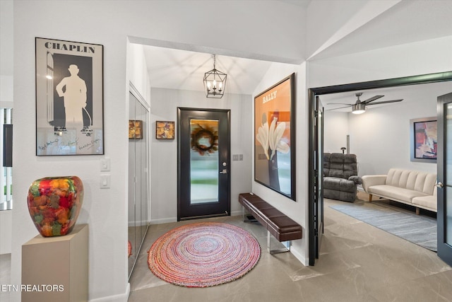 entrance foyer featuring an inviting chandelier