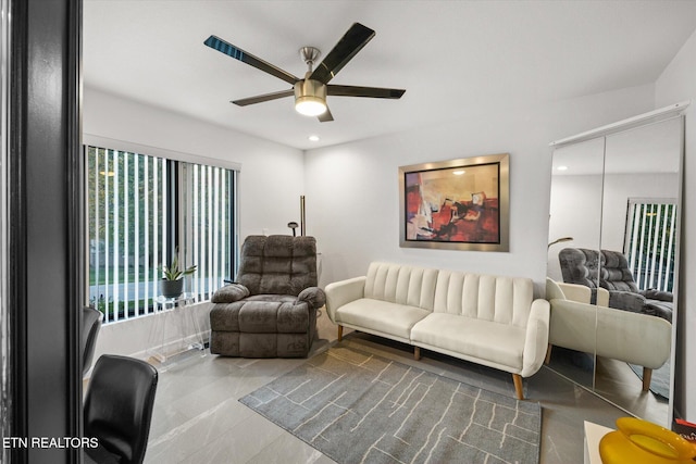 living room with ceiling fan