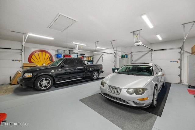 garage featuring a garage door opener