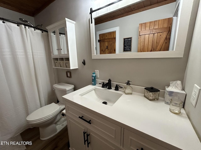 bathroom featuring hardwood / wood-style floors, toilet, wooden ceiling, a shower with curtain, and vanity