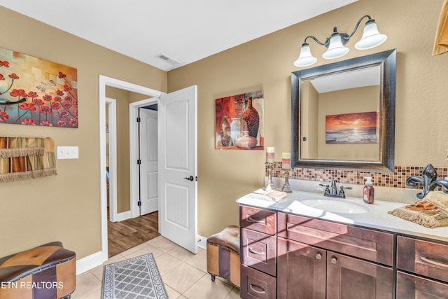 bathroom with vanity and tile patterned floors