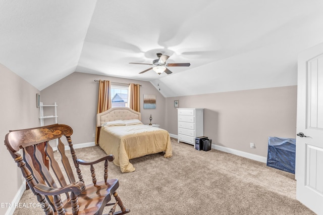 carpeted bedroom with ceiling fan and lofted ceiling