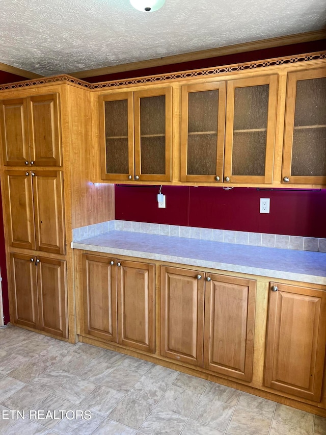 kitchen featuring a textured ceiling