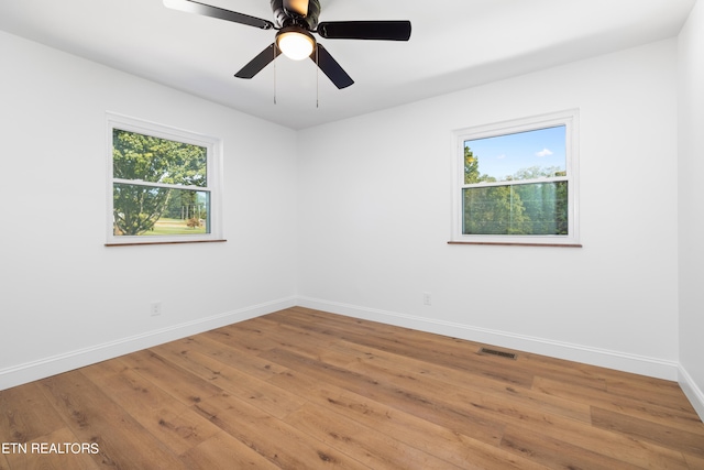 unfurnished room featuring wood-type flooring and ceiling fan