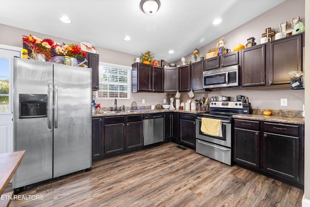 2670 Sharps Chapel Rd, Sharps Chapel, TN 37866 - kitchen featuring stainless steel appliances, a sink, wood finished floors, dark brown cabinetry, and recessed lighting
