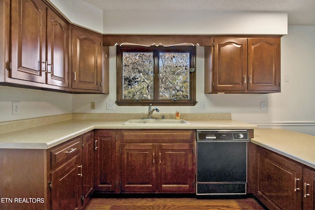 kitchen with black dishwasher and sink