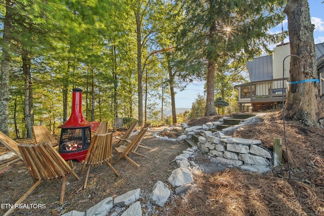 view of yard featuring a deck