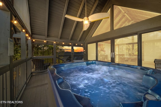 exterior space featuring a hot tub and ceiling fan