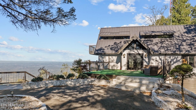 view of front of house with a patio area