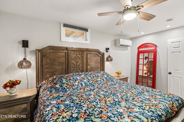 bedroom with a wall mounted AC and ceiling fan