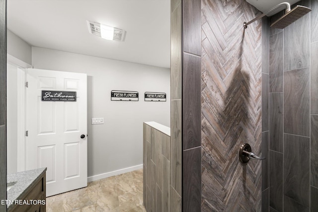 bathroom with vanity and walk in shower