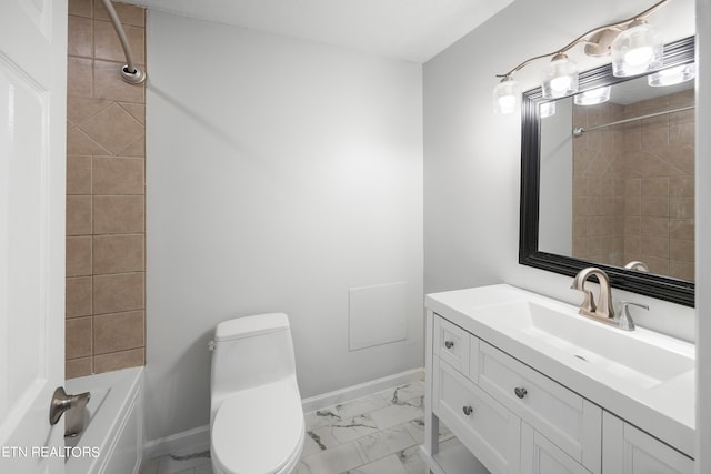 bathroom with toilet, bathing tub / shower combination, vanity, baseboards, and marble finish floor