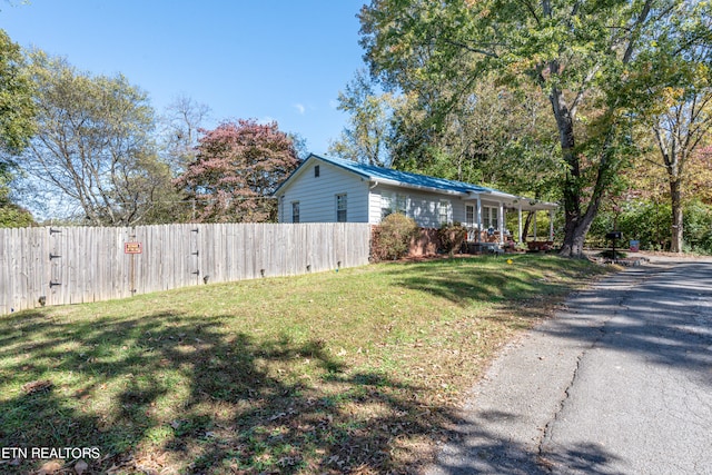 exterior space with a front yard