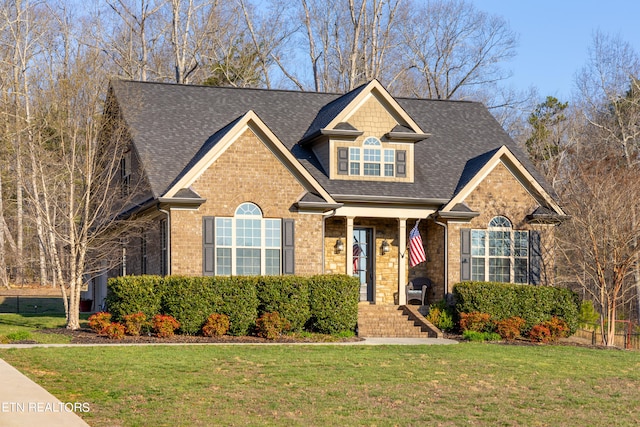 view of front facade with a front yard