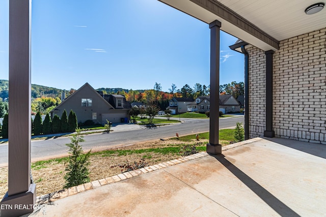 view of patio / terrace featuring a residential view