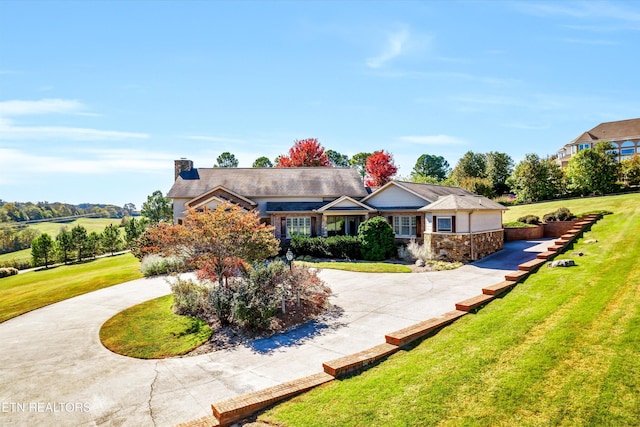 3909 Logans Landing Cir, Louisville, TN 37777 - view of front of home featuring a front lawn and curved driveway