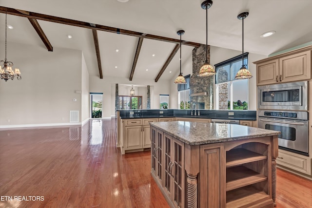 3909 Logans Landing Cir, Louisville, TN 37777 - kitchen featuring light wood-style flooring, stainless steel appliances, open shelves, a sink, and open floor plan