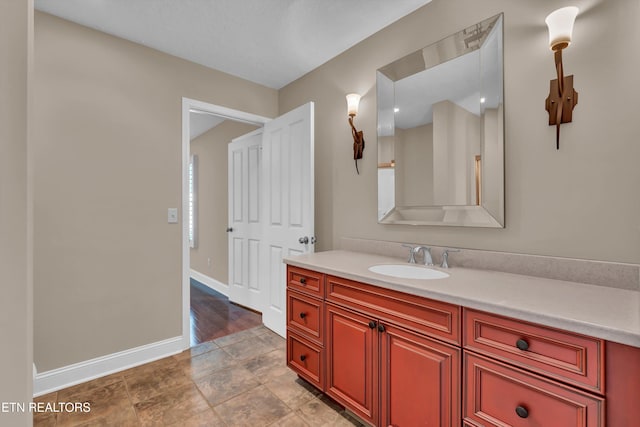 bathroom featuring vanity and hardwood / wood-style flooring