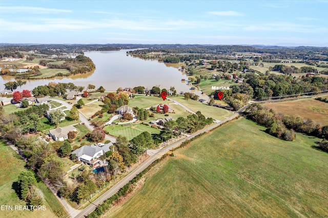 bird's eye view featuring a rural view and a water view