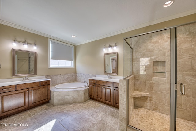 bathroom with vanity, crown molding, and plus walk in shower