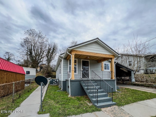 bungalow-style home with covered porch