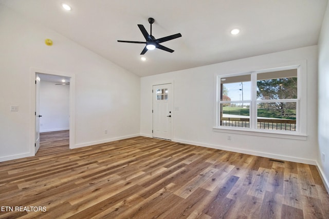 interior space with wood-type flooring, high vaulted ceiling, and ceiling fan