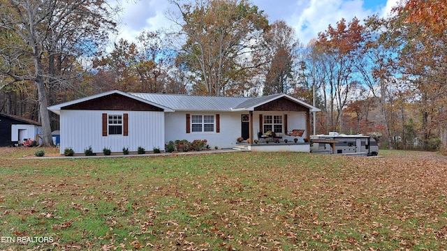 single story home with a jacuzzi, a patio area, and a front yard