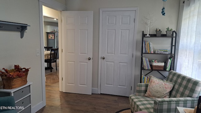 living area featuring dark hardwood / wood-style floors