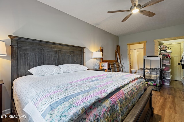 bedroom featuring dark wood-type flooring and ceiling fan