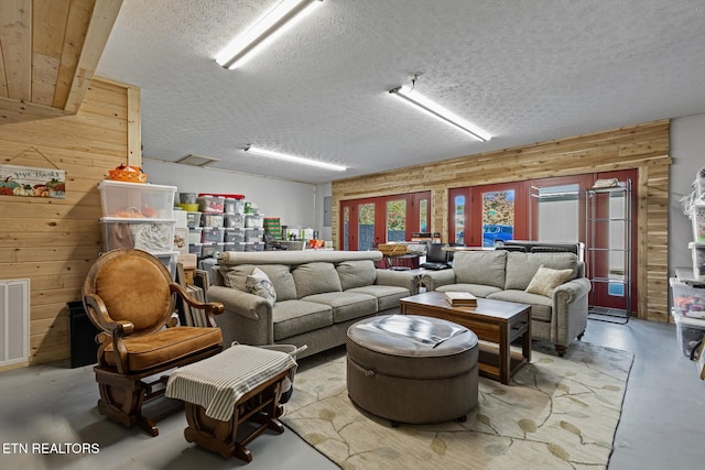 living room featuring wooden walls