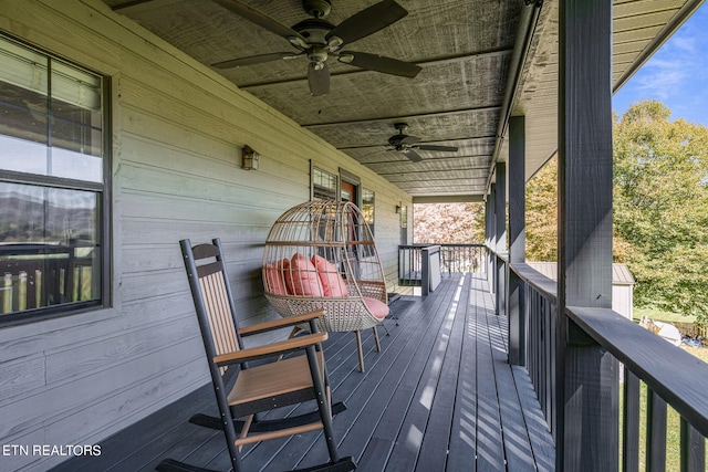 wooden terrace with ceiling fan