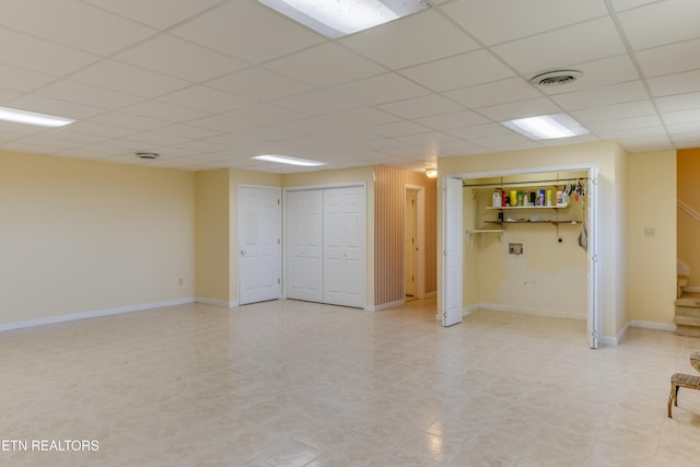 basement with a drop ceiling