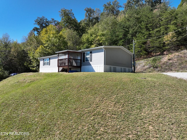 exterior space featuring a front yard