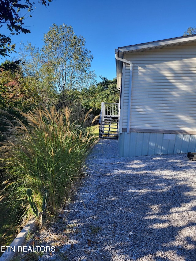 view of yard with a wooden deck