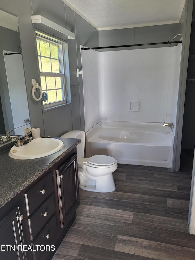 full bathroom featuring vanity, toilet, and bathing tub / shower combination