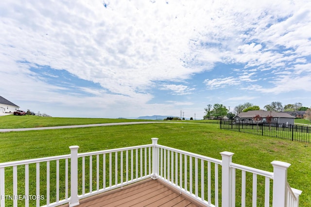 deck featuring a yard