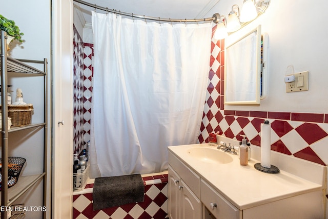 full bathroom featuring tile patterned floors, shower / tub combo with curtain, and vanity