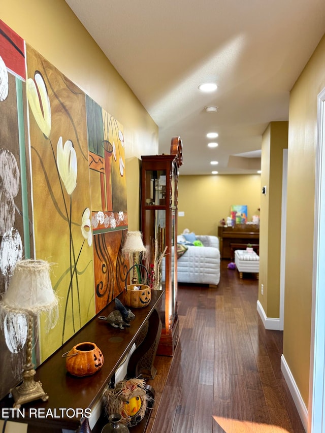 corridor featuring dark hardwood / wood-style flooring