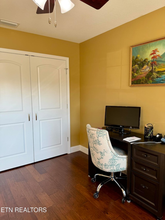 office with ceiling fan and dark hardwood / wood-style flooring