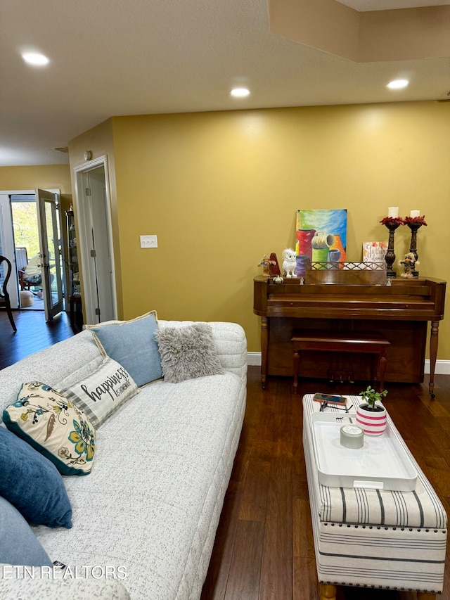 bedroom with dark hardwood / wood-style flooring