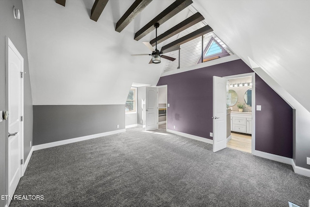 bonus room featuring vaulted ceiling with beams, carpet floors, and ceiling fan