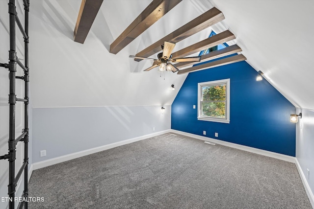 bonus room featuring lofted ceiling with beams, carpet floors, and ceiling fan