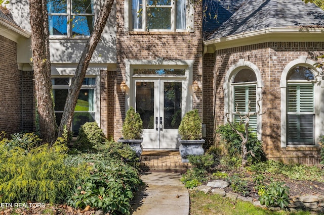 entrance to property featuring french doors