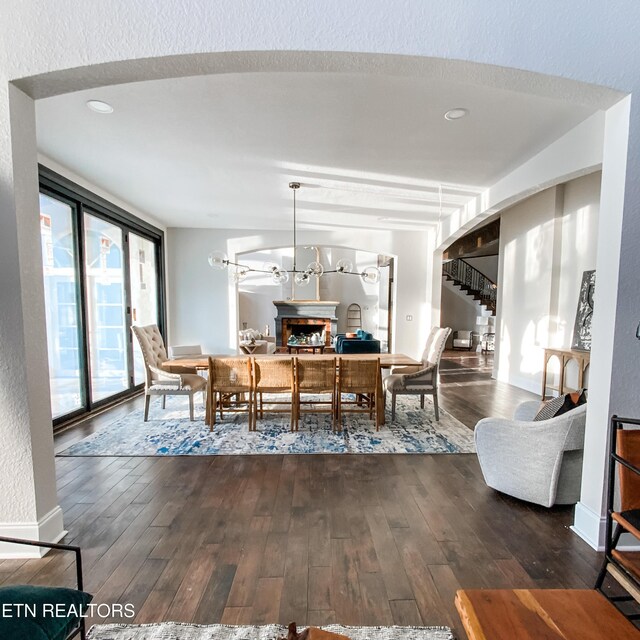 8719 Inlet Dr, Knoxville, TN 37922 - dining space with hardwood / wood-style floors, a fireplace, and stairs